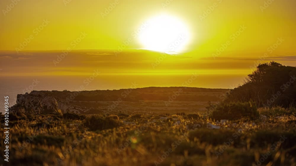 Magical sunrise of Malta with massive yellow glow, time lapse view Magical sunrise of Malta with massive yellow glow, time lapse view