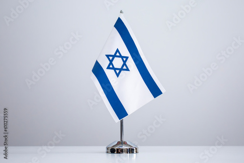 Small national flag of the Israel on a white background.