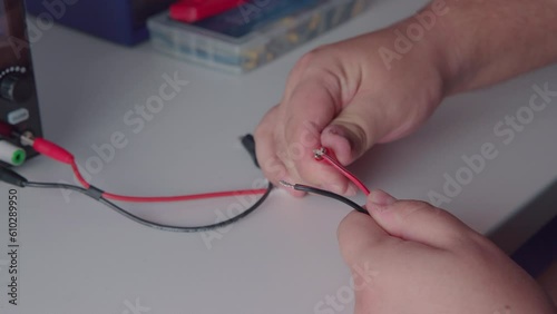 Connecting Black Cable to Black Terminal and Red Cable to Red Terminal