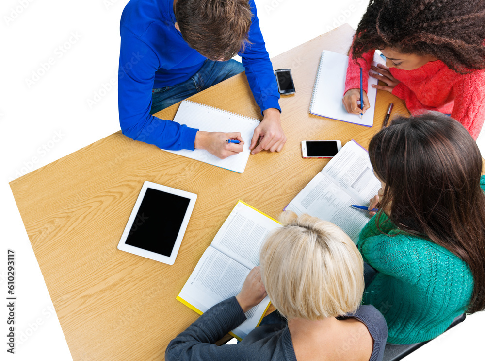 Group of young students studying together at desk Group of young students studying together at desk