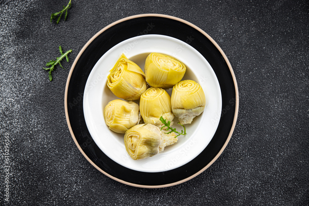 artichoke canned food healthy meal food snack on the table copy space food background rustic top view keto or paleo diet veggie vegan or vegetarian food artichoke canned food healthy meal food snack on the table copy space food background rustic top view keto or paleo diet veggie vegan or vegetarian food