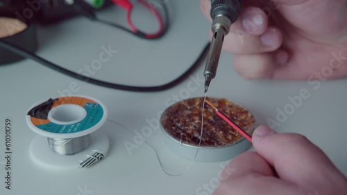 Skilled Man Hands Soldering Electronics
