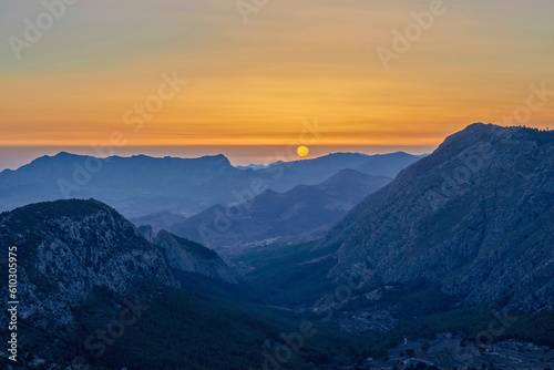 Sunset in the Sierra del Malladar near the penyo roc and el pas of the contador. In the province of Alicante, Benimantell, Spain.