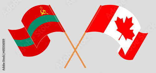 Crossed and waving flags of Transnistria and Canada