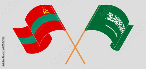 Crossed and waving flags of Transnistria and Saudi Arabia