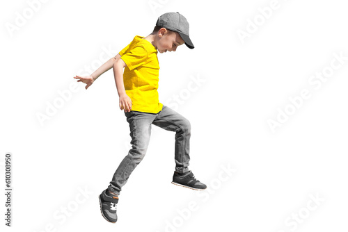a boy jumps on a transparent background in a yellow t-shirt © vovan