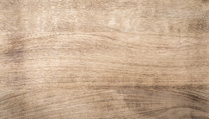 Light brown rough grainy mango wood texture background