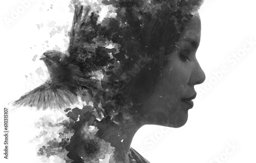 A conceptual black and white paintography portrait of a woman's profile
