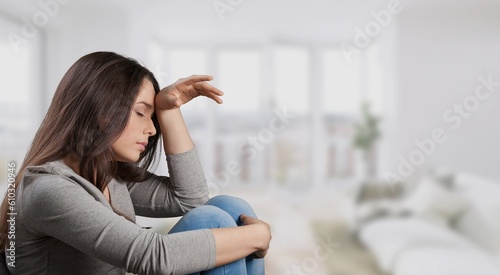 Young woman feels upset at home
