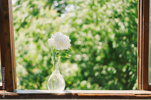 Fototapeta Naklejka Na Ścianę i Meble -  White peonies on a wooden window. Romantic concept. Vintage style