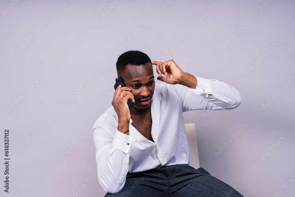 Happy african american young businessman in formal suit portrait. Confident black guy posing Happy african american young businessman in formal suit portrait. Confident black guy posing