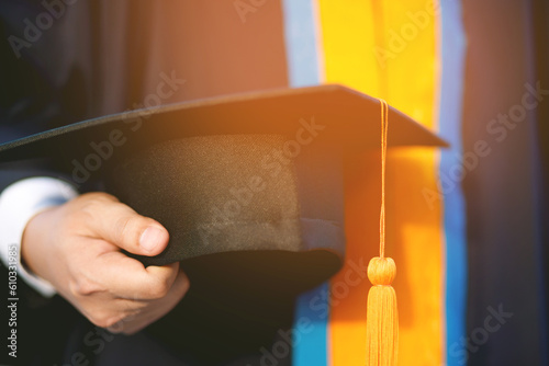 close up hand graduation hats during commencement success, Concept education congratulate the graduate in University outdoors.