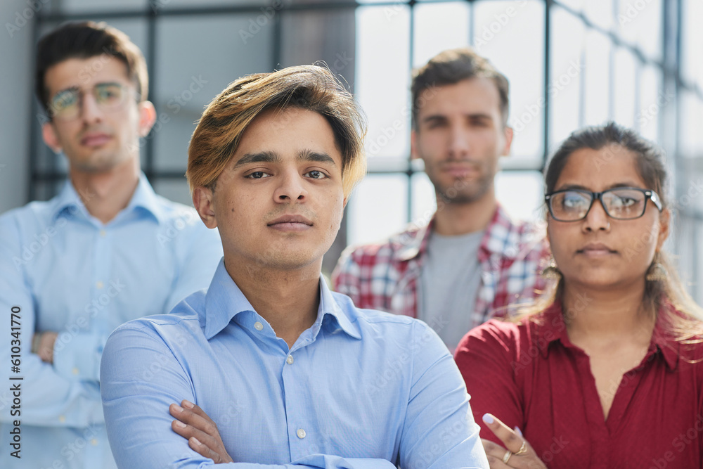 Confidence is a wonderful thing. Cropped portrait of a diverse group of corporate businesspeople standing with their arms folded in the office.