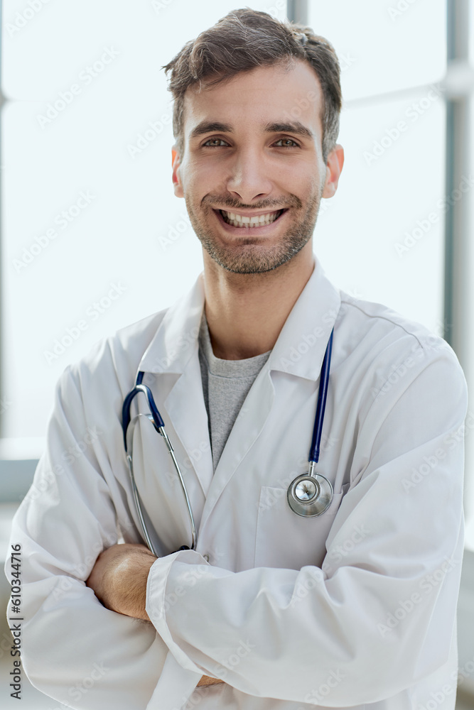 Close-up portrait of a smiling male doctor Close-up portrait of a smiling male doctor