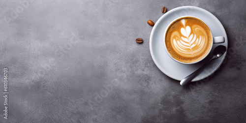Latte art coffee on textured gray background