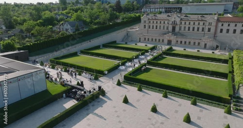 aerial view of the decorating team prepares the venue for the wedding party at mimi luxury castle photo