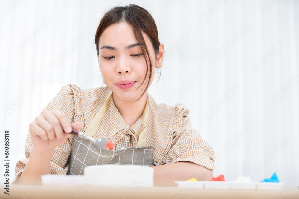 asian female chef bake delicious dessert face flour dough cake bakery with sugar cream and strawberry bake in home kitchen, homemade cake asian female chef bake delicious dessert face flour dough cake bakery with sugar cream and strawberry bake in home kitchen, homemade cake