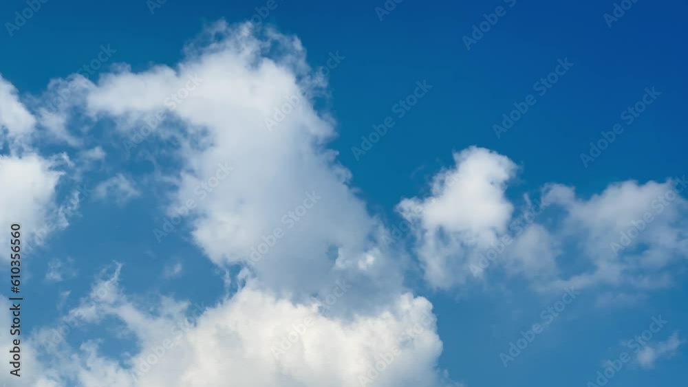 4K Time Lapse White clouds blue sky background 4K Time Lapse White clouds blue sky background