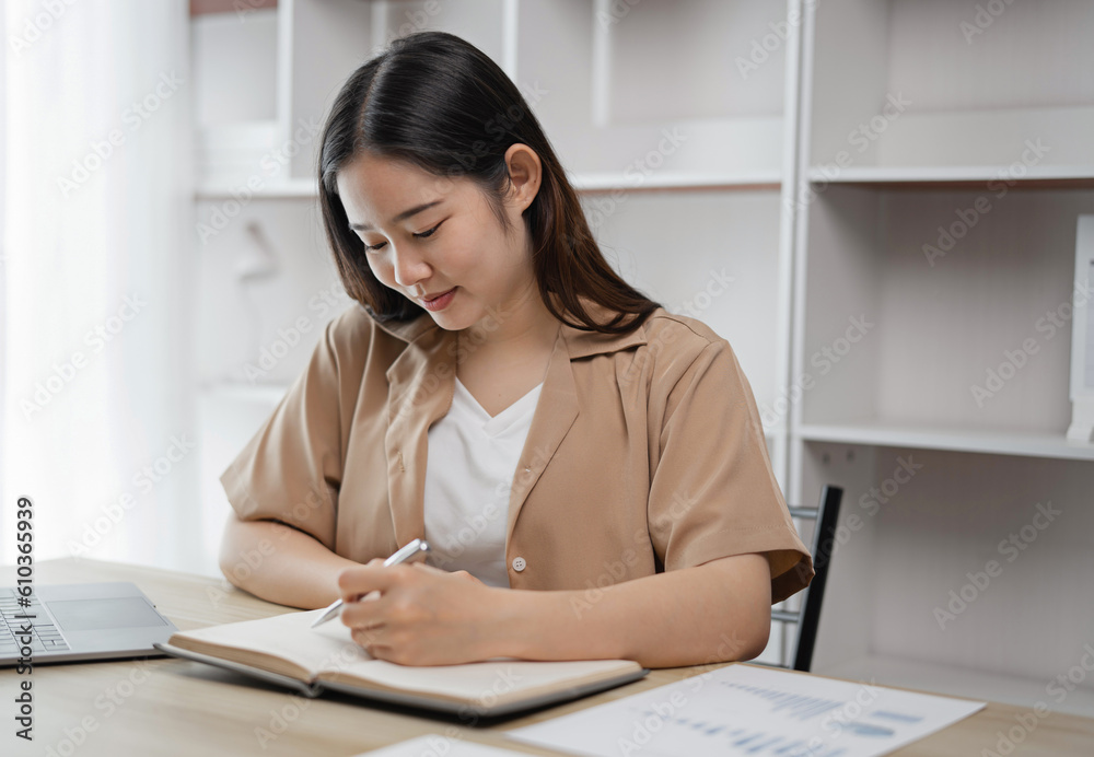 Young asian student watching lesson online and studying from home. online education concept