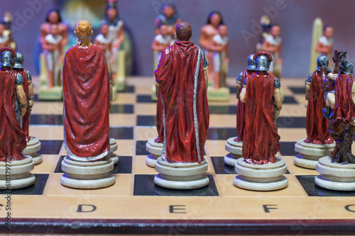 Obraz na plátně chess board with various pieces of Romans and Egyptians