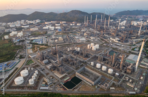 Aerial top view oil and gas refinery background, Business petrochemical industrial, Refinery oil and gas factory power and fuel energy, Ecosystem estates. Fuel refinery industry at night