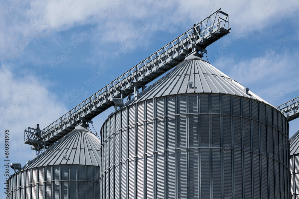 Steel grain storage silos with a conical bottom can be used for various purposes. Industrial facilities of feed and flour mills.