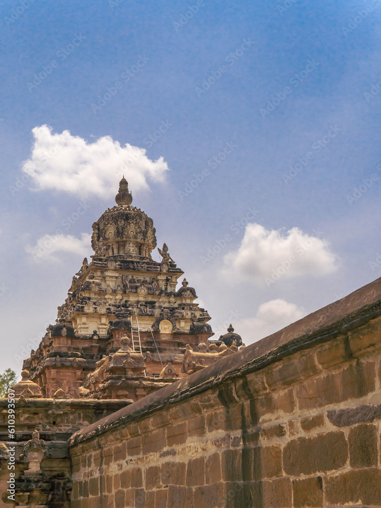 Captivating beauty of a temple in Tanjore in its picturesque surroundings, where the architectural splendour harmoniously blends with nature's serenity