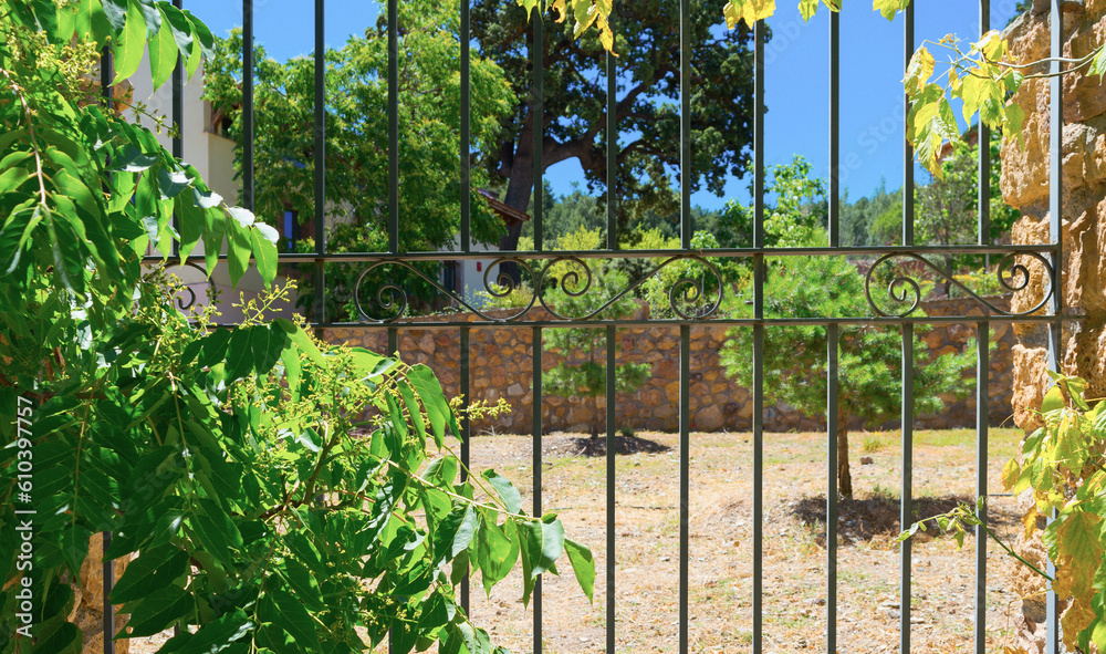 iron fence in public park iron fence in public park