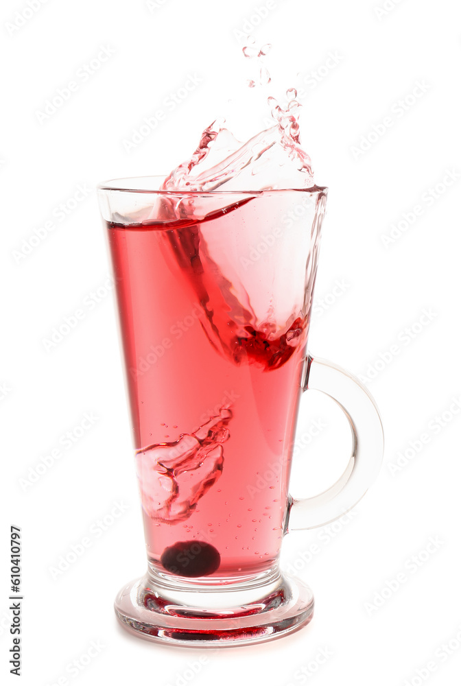 Glass of tasty blueberry cider with splashes, ice cube and berries isolated on white background Glass of tasty blueberry cider with splashes, ice cube and berries isolated on white background