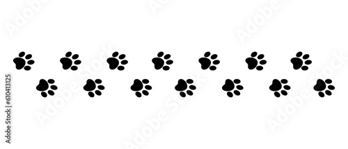 Black animal dog footprints. paw track