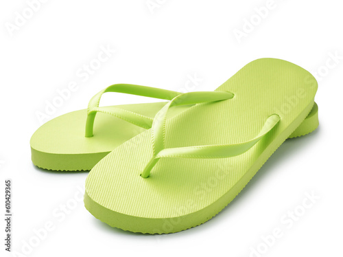 Pair of stylish green flip-flops on white background