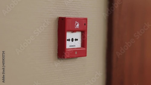 Red fire alarm button. Red fire alarm button on the wall in the room. Fire alarm button on the wall. Industrial fire alarm system equipment for emergencies. emergency fire alarm.