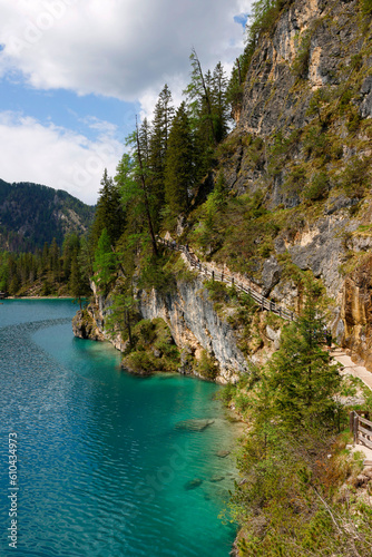 Landscape view of the emerald smooth surface of Lago di Braies in the Dolomites, northern Italy, Europe