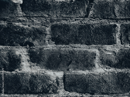abstract black background of bricks. combination of the rustic texture of bricks and the striking darkness of a black background creates a visually captivating contrast