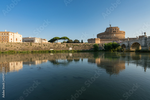 Saint Angel Castle and bridge seen from Tiber river canal in Rome. Italy