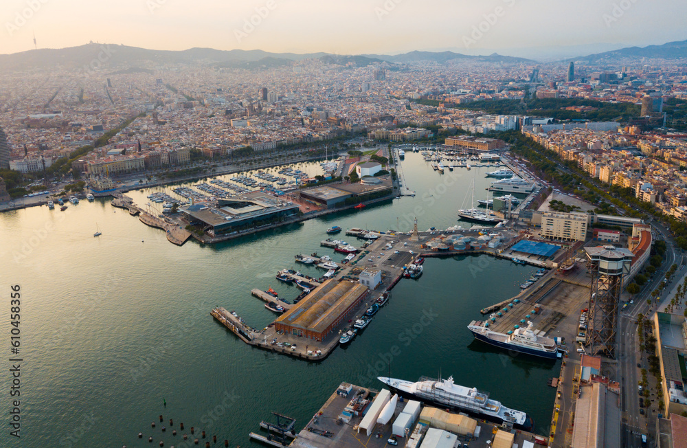 Image of aerial view from drones of old port in Barcelona with of sailboats and yachts