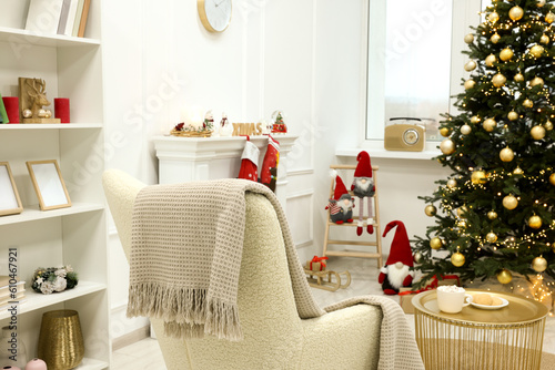 Beautiful Christmas tree and decor in living room. Interior design