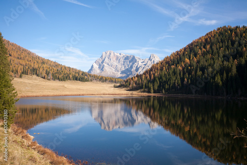 Alpine lake with dolomites in background, Calaita lake