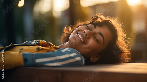 young woman relaxing outdoo...