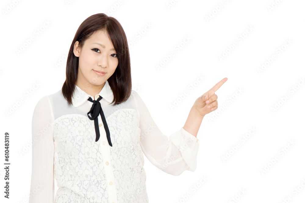 指を差す若い女性 Stock Photo | Adobe Stock