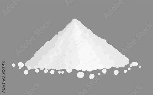 A pile of white powder matter on a gray background.