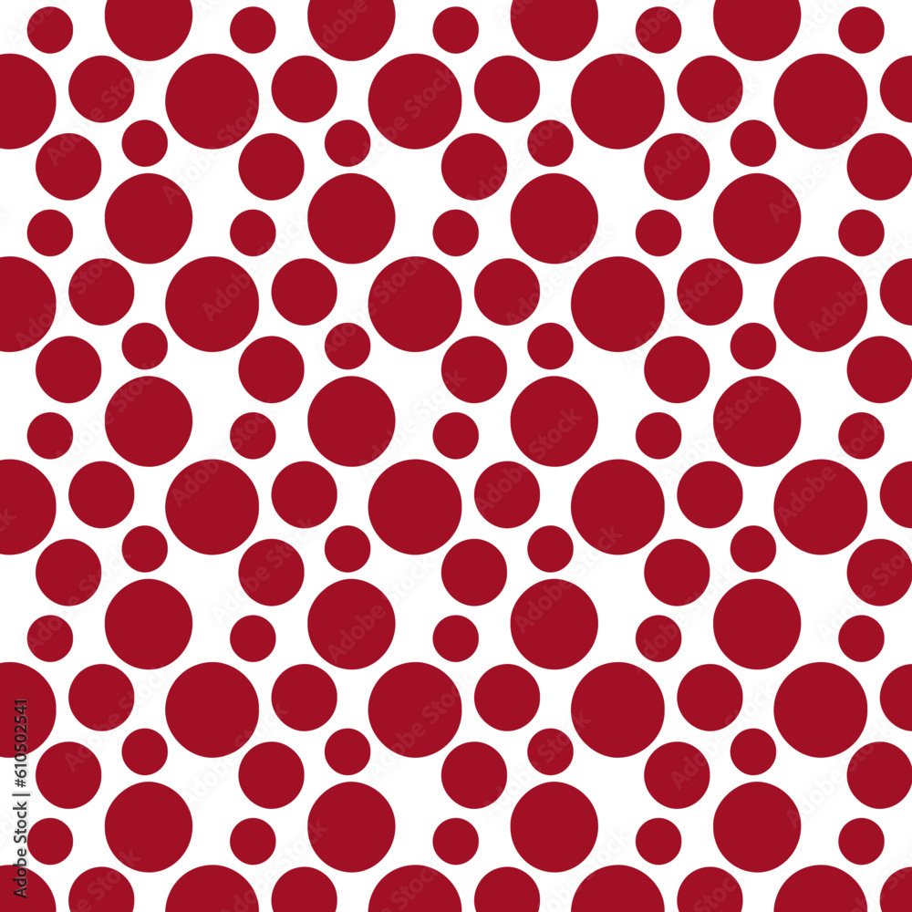 red polka dots of different sizes and arrangements