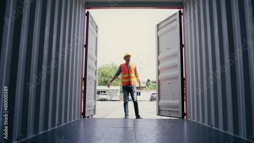 Foreman open container box walk in side and check neatness prepare to transport in terminal logistic warehouse. Cargo shipping Transport concept