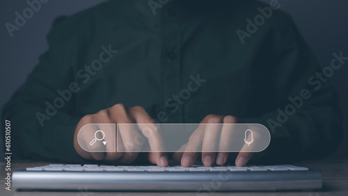 Man using computer searching browsing internet data information networking.