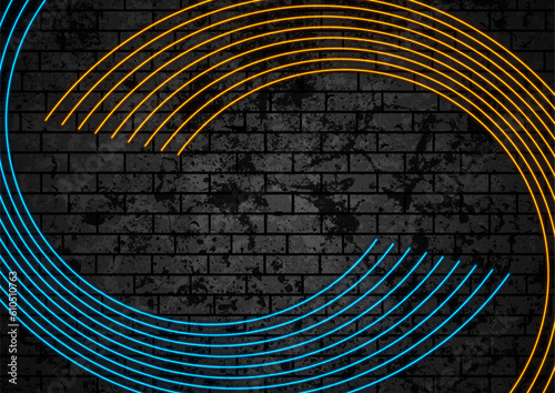 Blue orange neon curved lines on black brick grunge wall. Abstract vector background