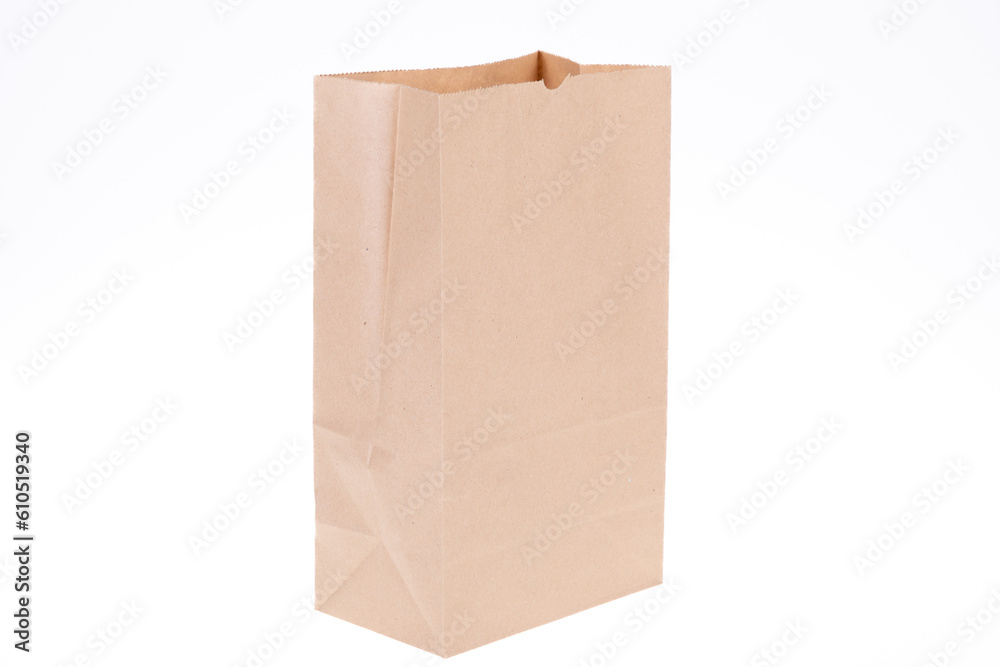 Recycled kraft paper shopping bag brown empty mock-up on white background Recycled kraft paper shopping bag brown empty mock-up on white background