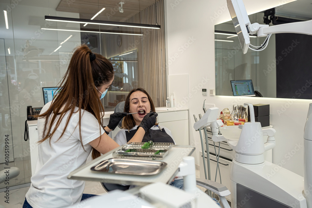 work of a female dentist in her own dentistry with a girl patient. work of a female dentist in her own dentistry with a girl patient.