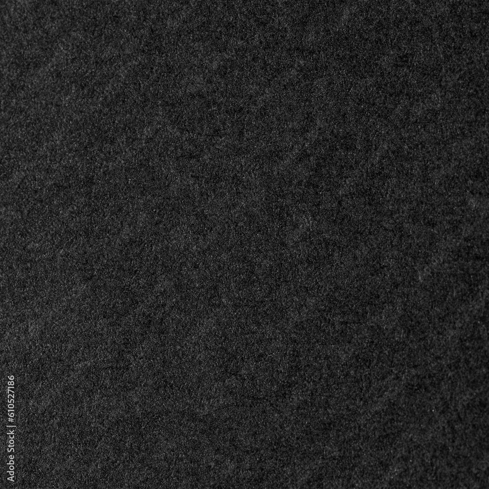 Fototapeta premium Black background based on natural felt texture. Gray background.
