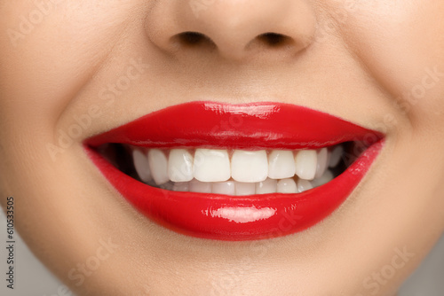 Smiling woman with healthy teeth  closeup view