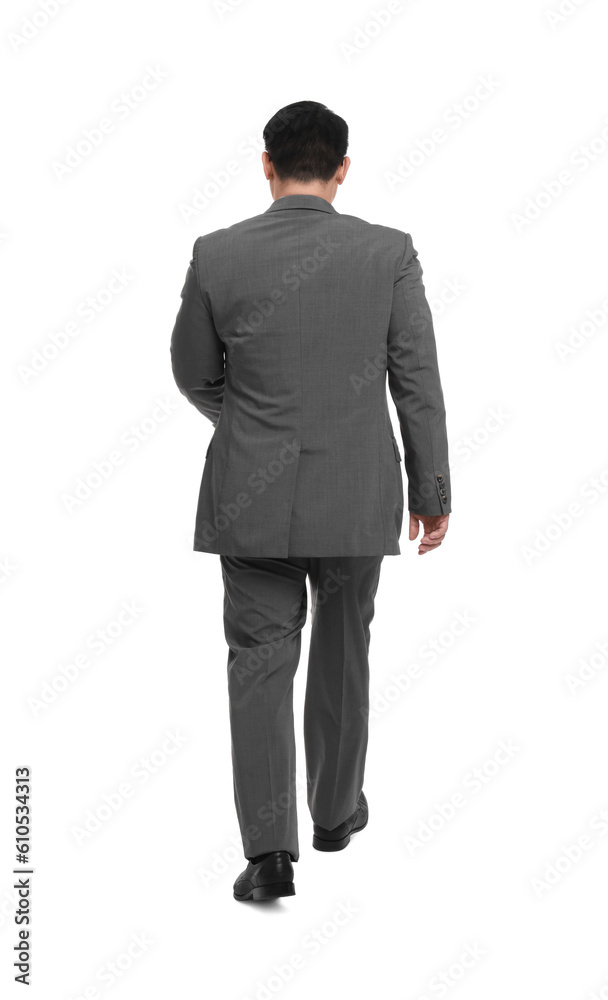 Businessman in suit walking on white background, back view Businessman in suit walking on white background, back view